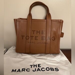 Marc Jacobs The Leather Medium Tote Bag in the color Argan Oil.